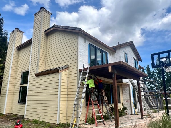 Outdoor home siding being installed by a remodeling contractor
