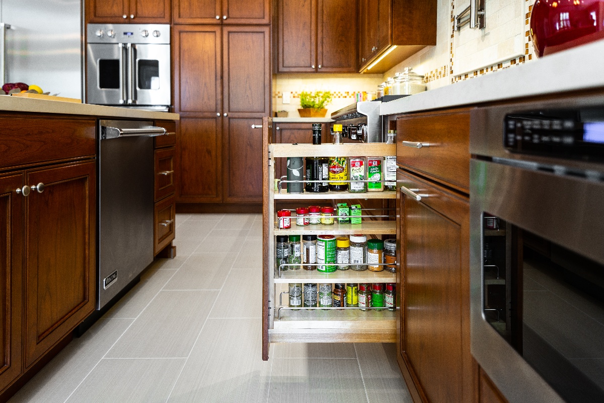 Spice race pullout cabinet that's built into the kitchen counter