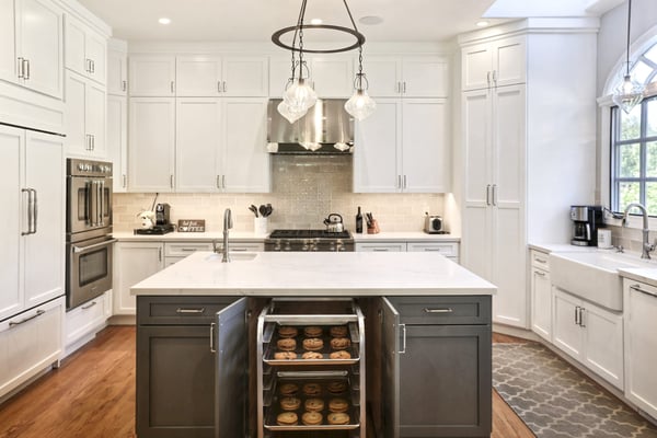 Simple and pure kitchen built for a home chef with a textured tile backsplash