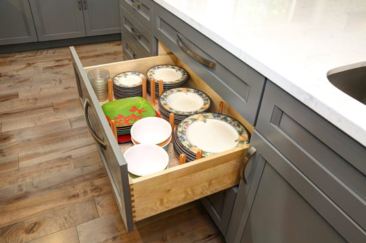 Kitchen drawer full of plates