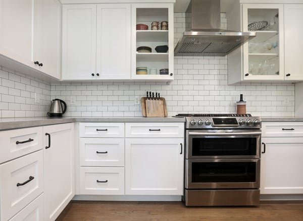 White and pure kitchen remodel with a ceramic or porcelain tile backsplash