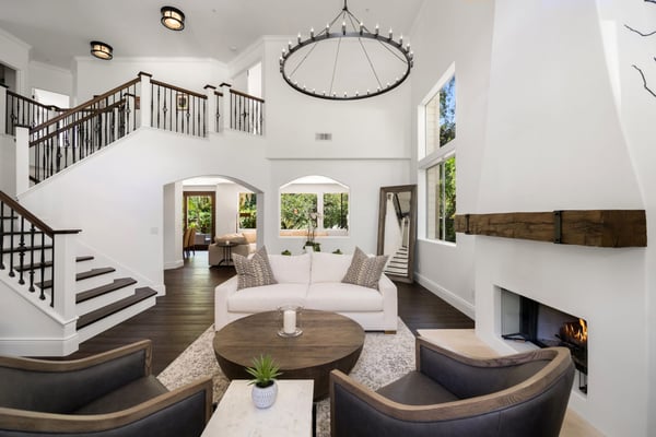 Gorgeous Mediterranean foyer and front entrance with round black chandelier