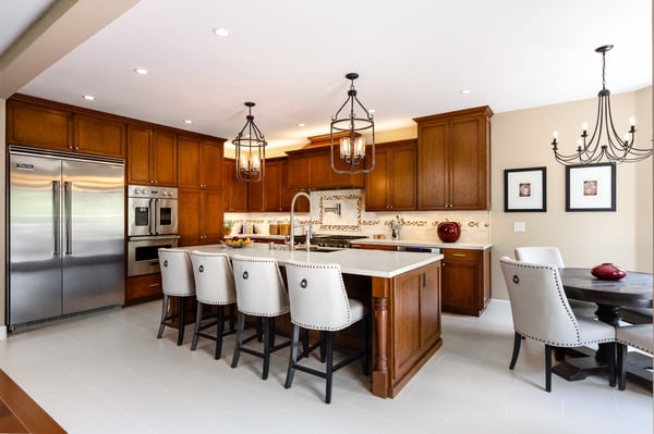 Kitchen remodel styled with rich hues and classic furniture