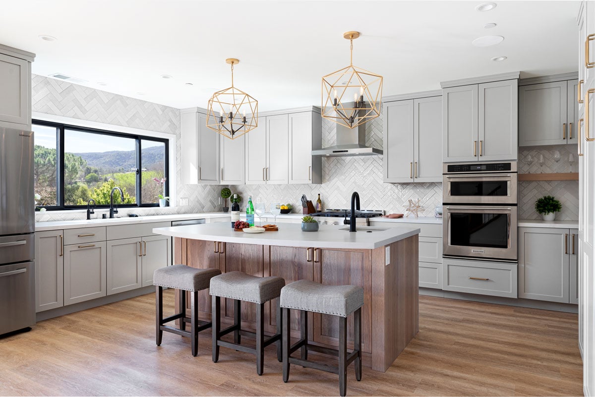 White bright kitchen with light wood motifs