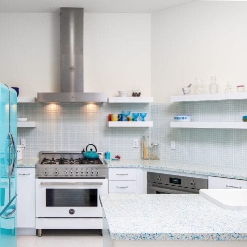 Kitchen with stainless steel exhaust fan