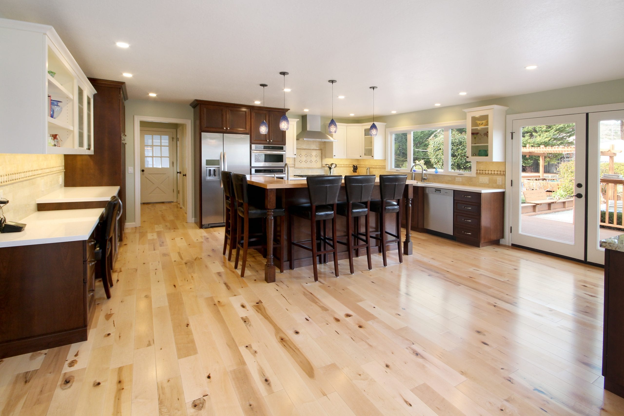 Kitchen remodel after photo featuring hardwood floors and modern style