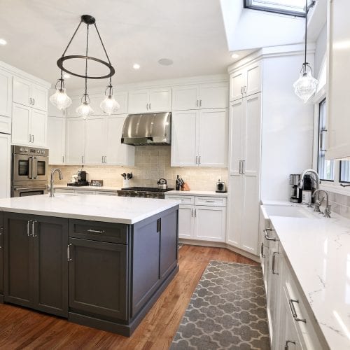 Grey wood cabinets embedded into kitchen island