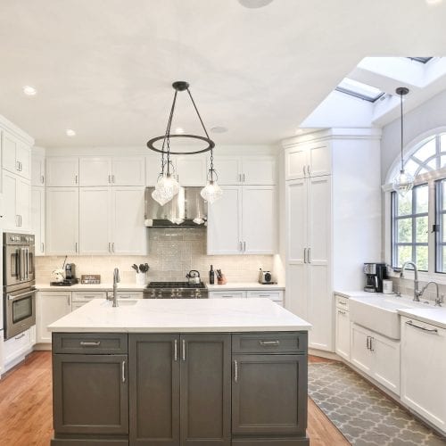 Kitchen with all white wood cabinets