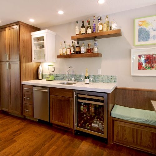 Contemporary kitchen mini-bar with a small refrigerator and sink