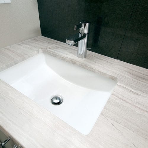 Bathroom sink with grey marbled countertop