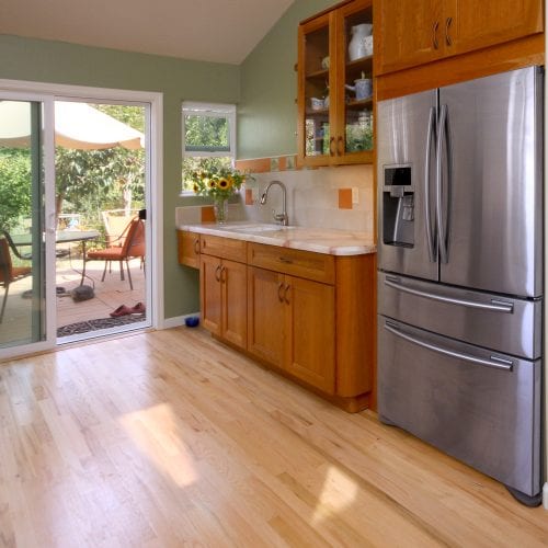 Outdoor entrance from kitchen with patio in background