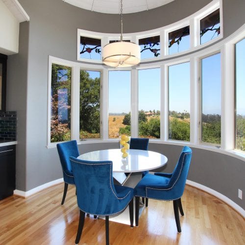 Dining room table with blue chairs