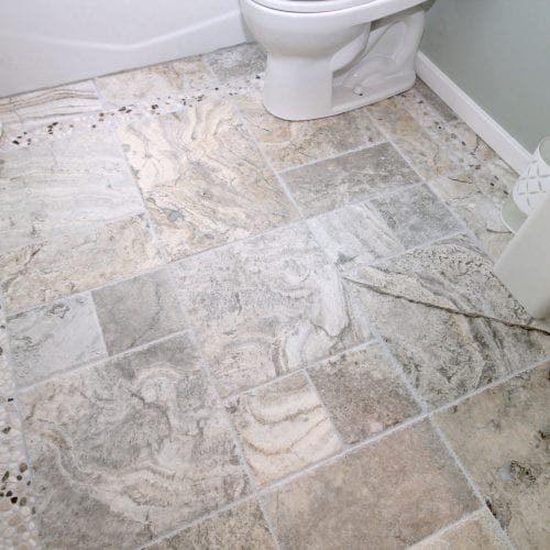 Multi-sized bathroom tile flooring