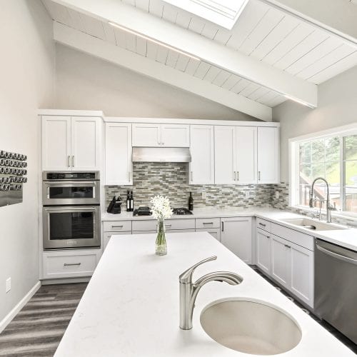 Circular sink embedded into marble countertop