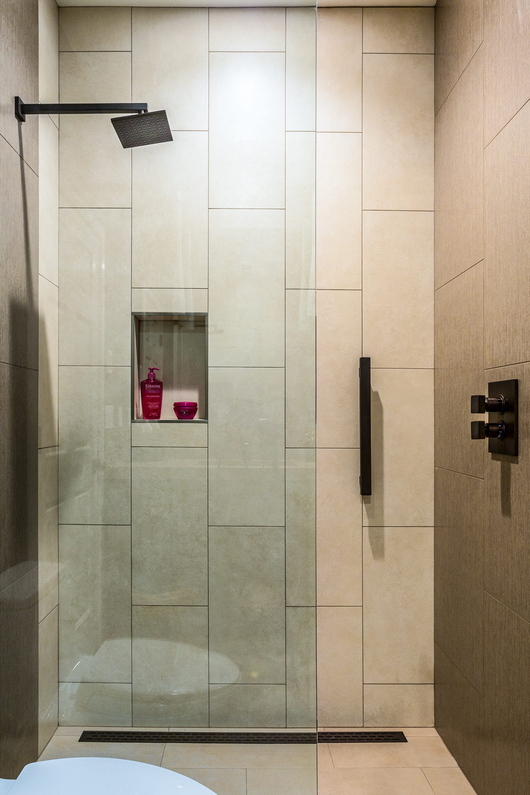 Shower with glass sliding door