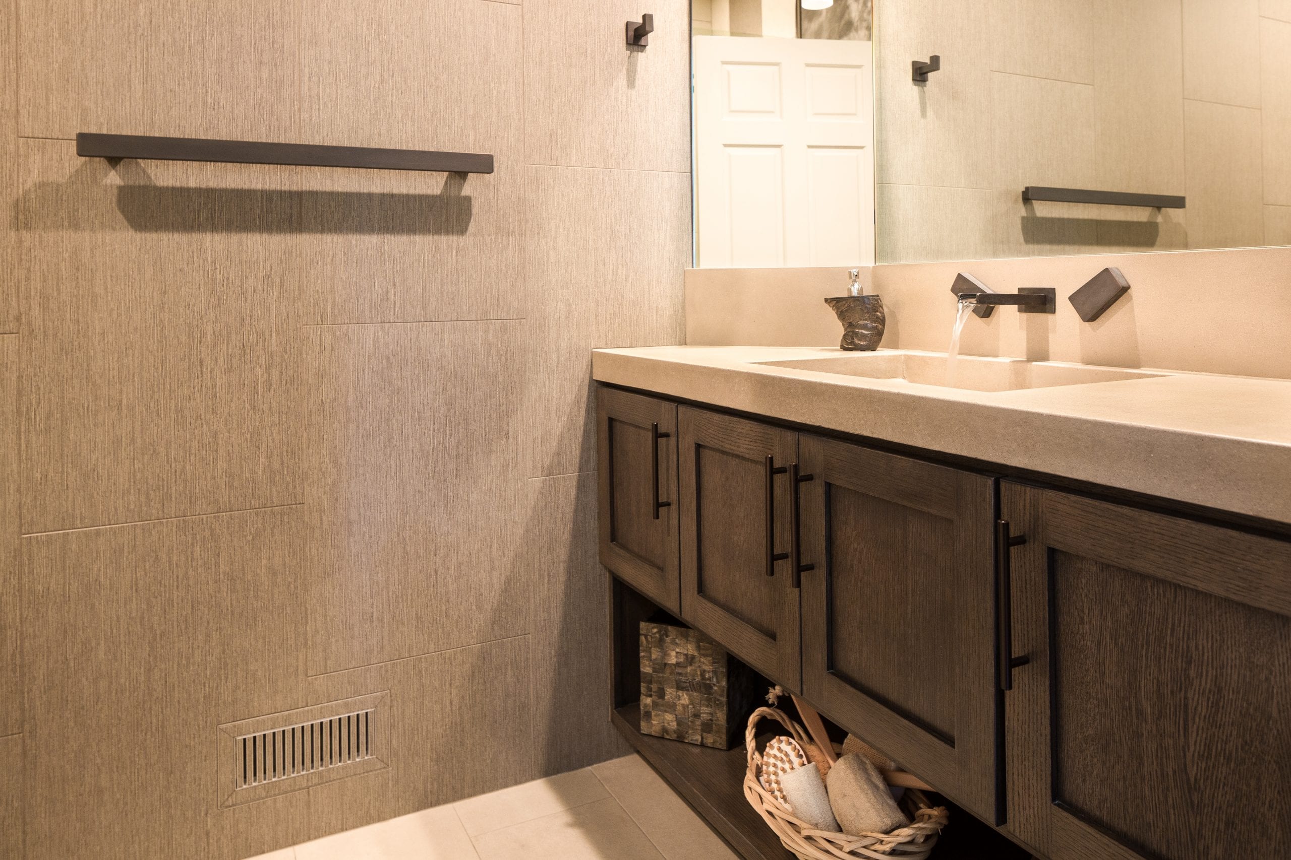 Rustic wood cabinets with large glass mirror