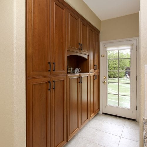 Large wooden cabinets mounted into the wall