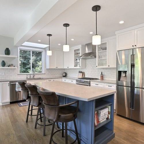 Kitchen island with shelving units for cookbooks