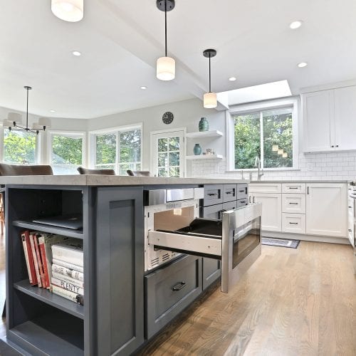 Pull-out microwave embedded into kitchen island