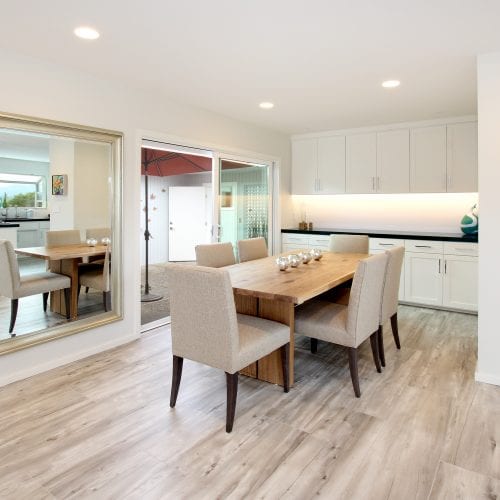 Dining room with wooden table and seating for six