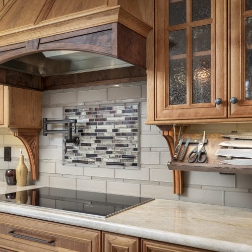 Stove with glass backsplash