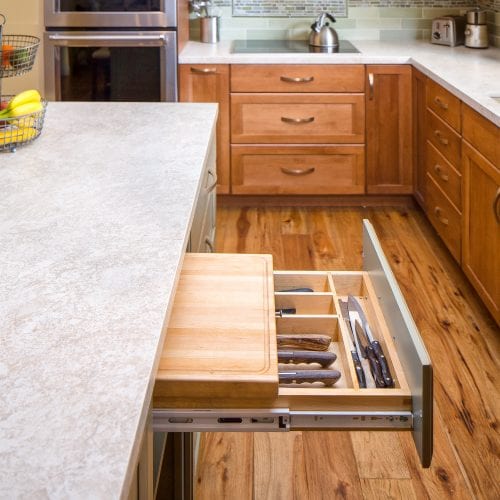 Pull out drawer with built in cutting board