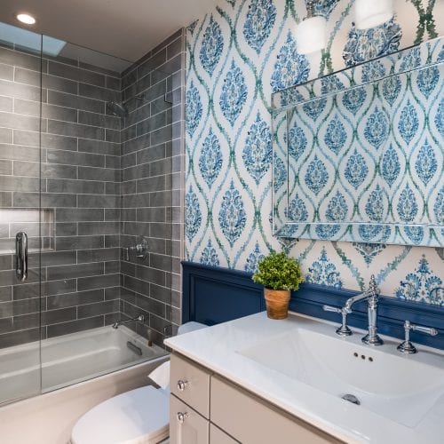 Bathroom with blue stenciling on the walls