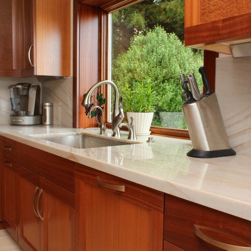 Kitchen counter with metal knife holder