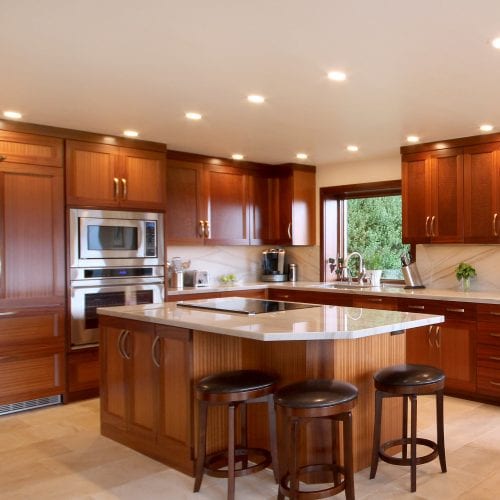 Kitchen island with red wood accent