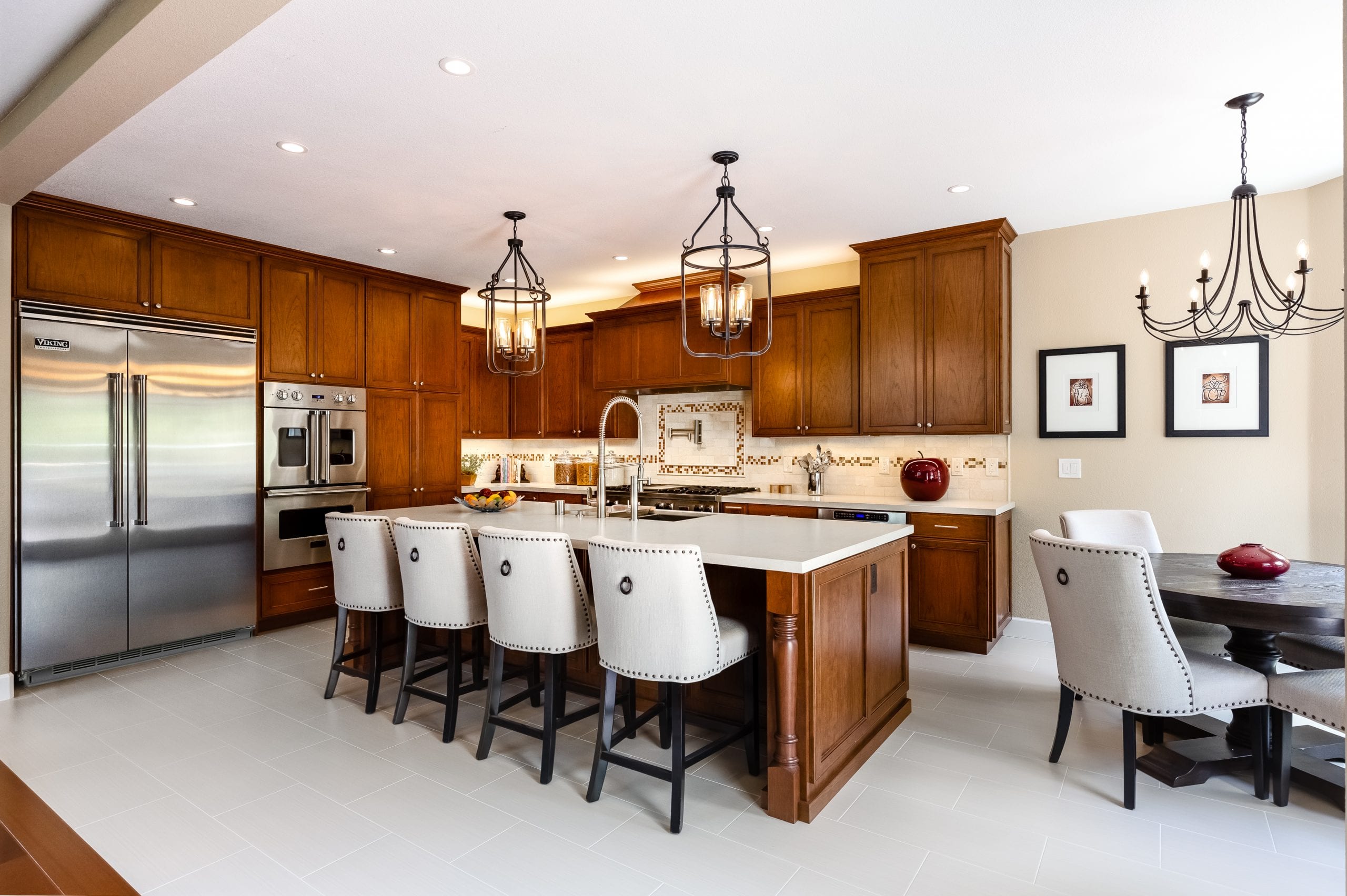 wide shot of kitchen showing full cabinet wall and kitchen island