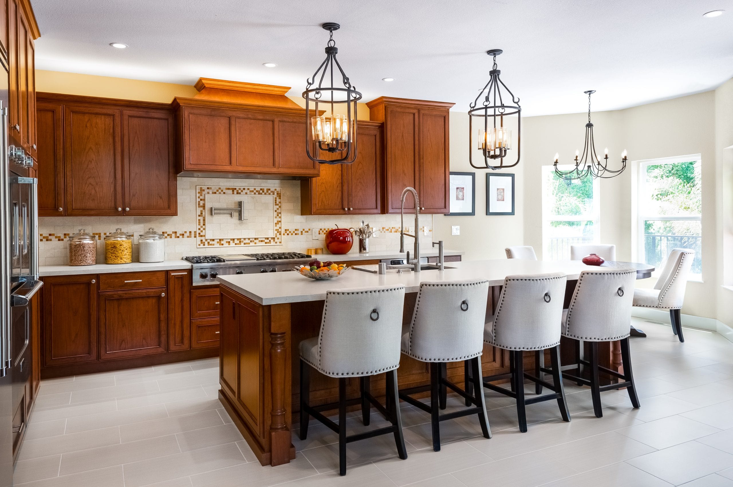 Metal hanging lamps above kitchen island